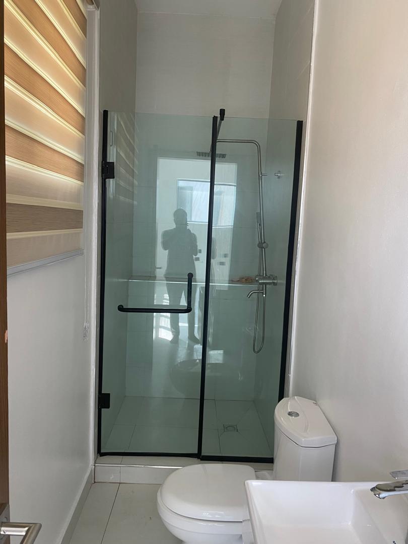 Aluminium framed shower cubicle installation